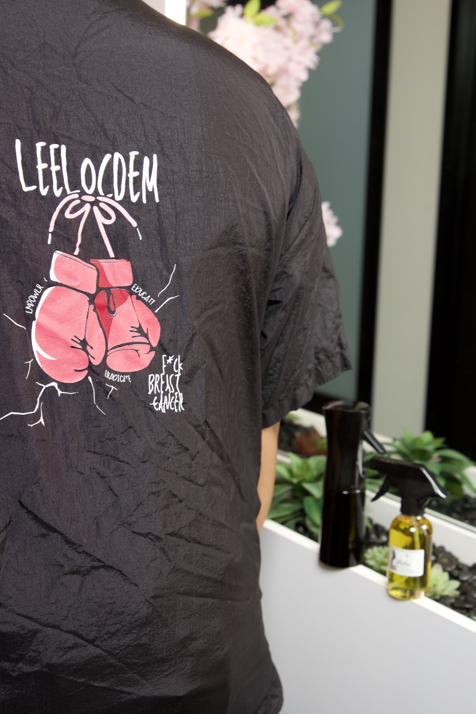 The LEELOCDEM awareness tee worn, back view